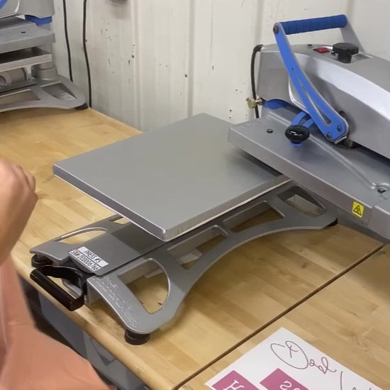 Instructional video for pressing a design onto a peach tee using sublimation press